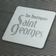 Logotype sur un marquage au sol. Les Boutiques Saint-Georges